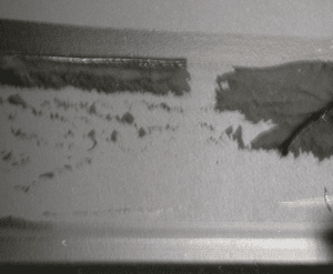 Interfacial Failure of Adhesive to Frit on Glass